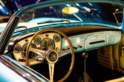 Image of a classic car interior. Image by Melk Hagelslag from Pixabay